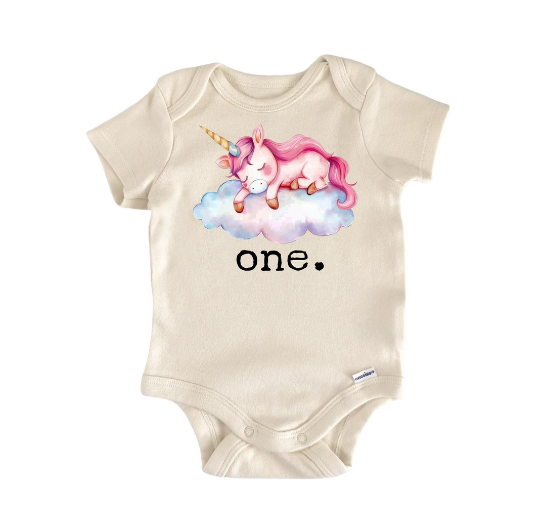 a white onesuit with a pink unicorn on it