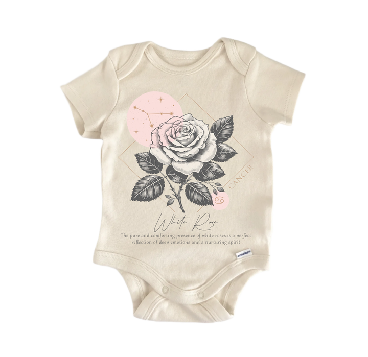A beige baby onesie with a rose design and astrological symbol printed on it.