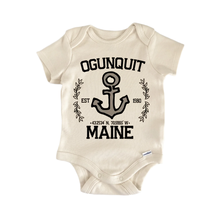 A beige baby onesie with a graphic design featuring an anchor and the text "OGUNQUIT EST 1980 MAINE" printed on it.