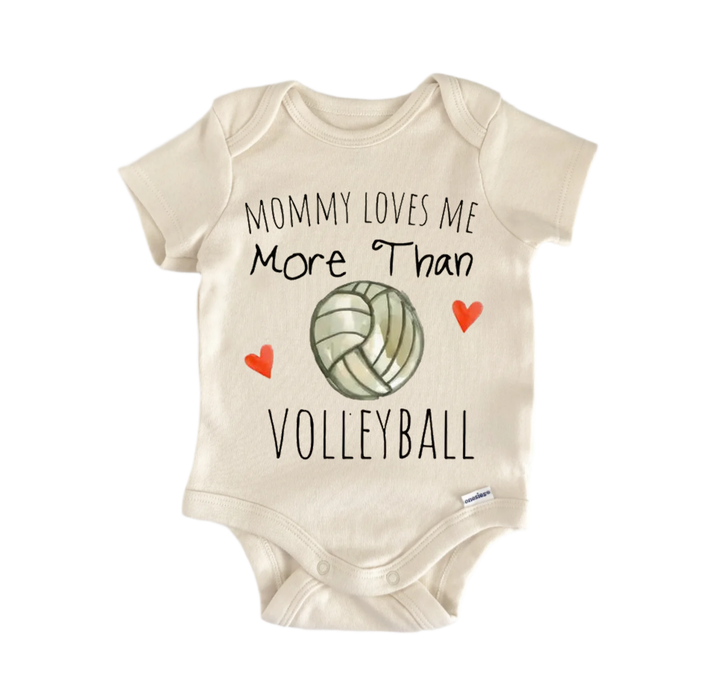 A baby onesie with the text "MOMMY LOVES ME MORE THAN VOLLEYBALL" printed on it, along with a volleyball graphic and two red hearts.