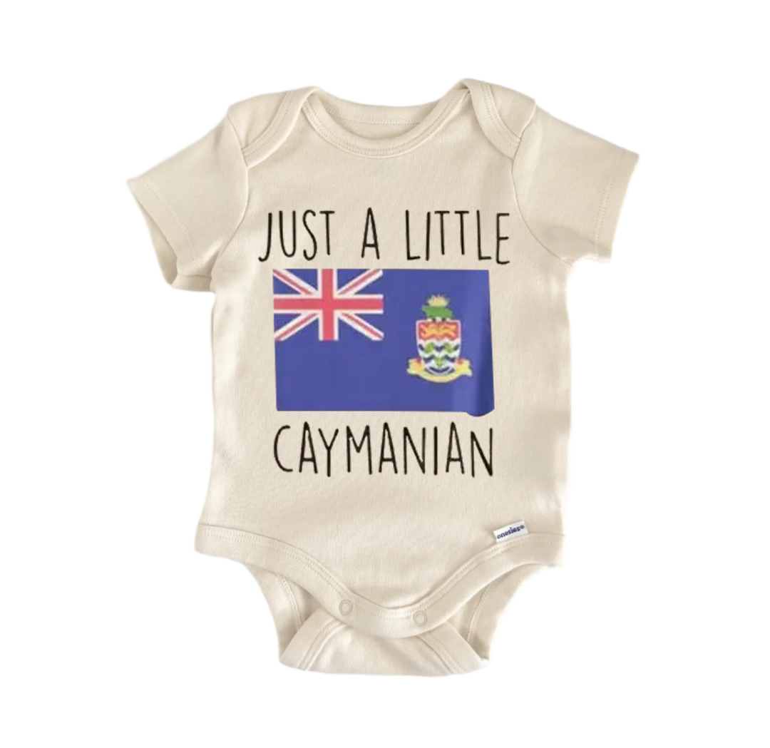 A beige baby onesie with the text "JUST A LITTLE Caymanian" printed on it, along with a small image of the Caymanian flag.