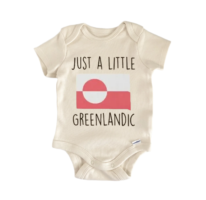 A beige baby onesie with the text "Just a little GREENLANDIC" printed on it, along with a graphic of the Greenland flag.
