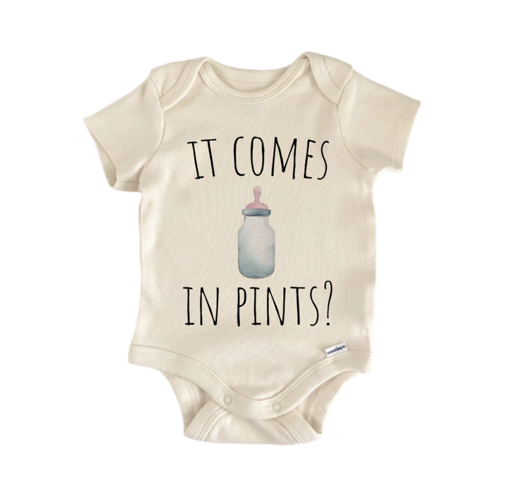 A beige baby onesie with the text "IT COMES IN PENTS?" printed on it, along with a graphic of a baby bottle.
