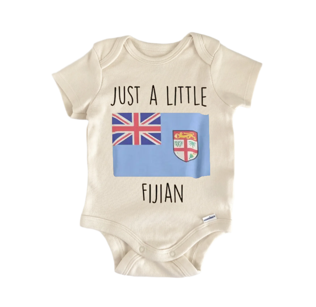 A beige baby onesie with the text "JUST A LITTLE FUJIAN" printed on it, along with a small image of the Fiji flag.
