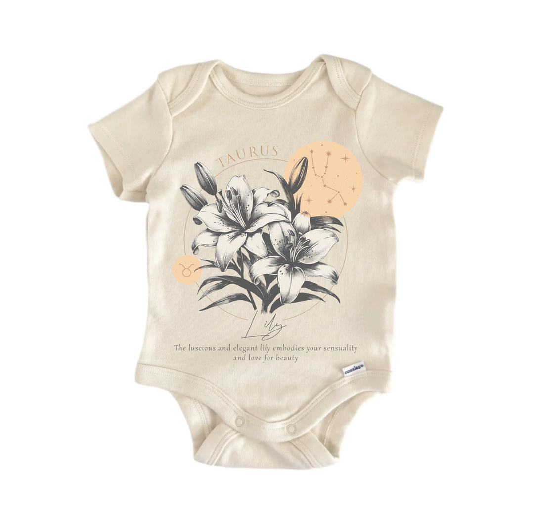 a beige baby onesie with a graphic design depicting a floral arrangement and astrological symbols, specifically the zodiac sign Taurus.