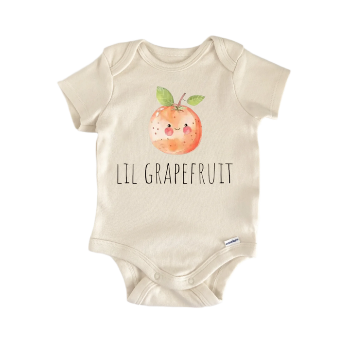 A beige baby onesie with a watercolor illustration of a grapefruit and the text "LIL GRAPEFRUIT" printed on it.