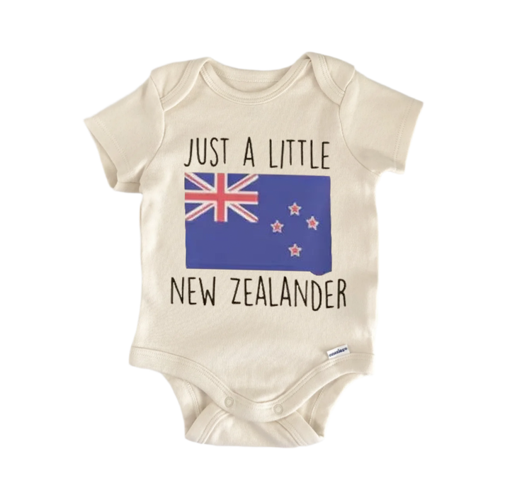 A baby onesie with the text "Just a little NEW ZEALANDER" printed on it, along with a small flag of New Zealand.