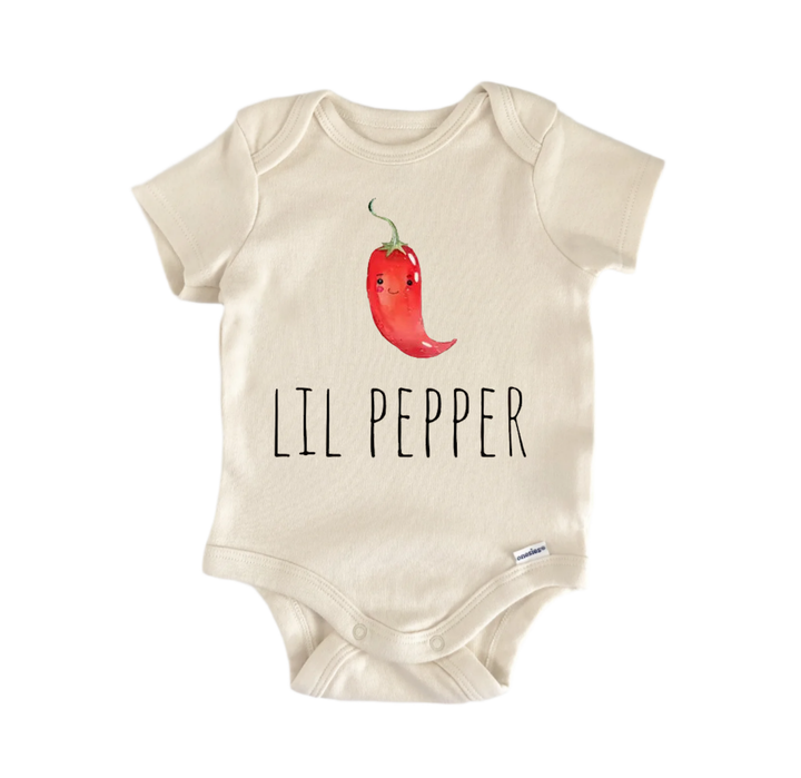 A beige baby onesie with a red chili pepper graphic and the text "LIL PEPPER" printed on it.