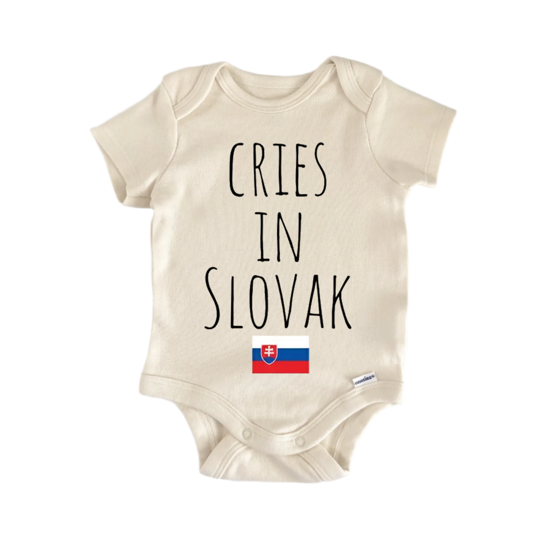 A beige baby onesie with the text "CRIES IN SLOVAK" printed on it, along with a small flag of Slovakia below the text.