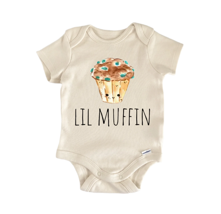 A beige baby onesie with a printed image of a muffin and the text "LIL Muffin" printed on it.