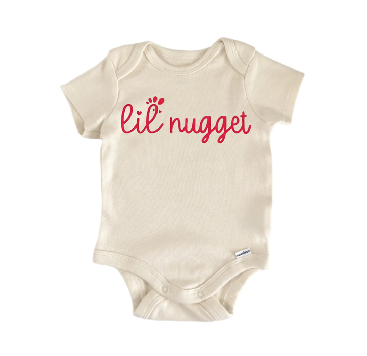 A beige baby onesie with the text "Lil' nugget" printed on it in red.