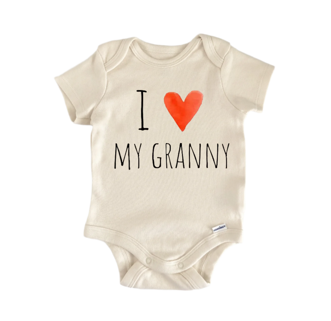 A beige baby onesie with a red heart and the text "I ♥ MY GRANNY" printed on it.