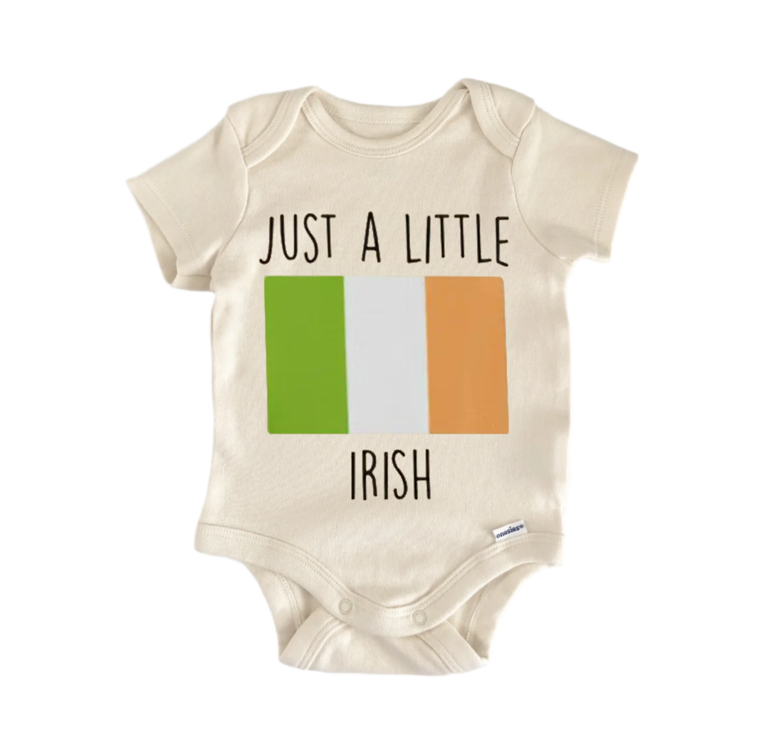 A baby onesie with the text "Just a little Irish" printed on it, along with the colors of the Irish flag (green, white, and orange).