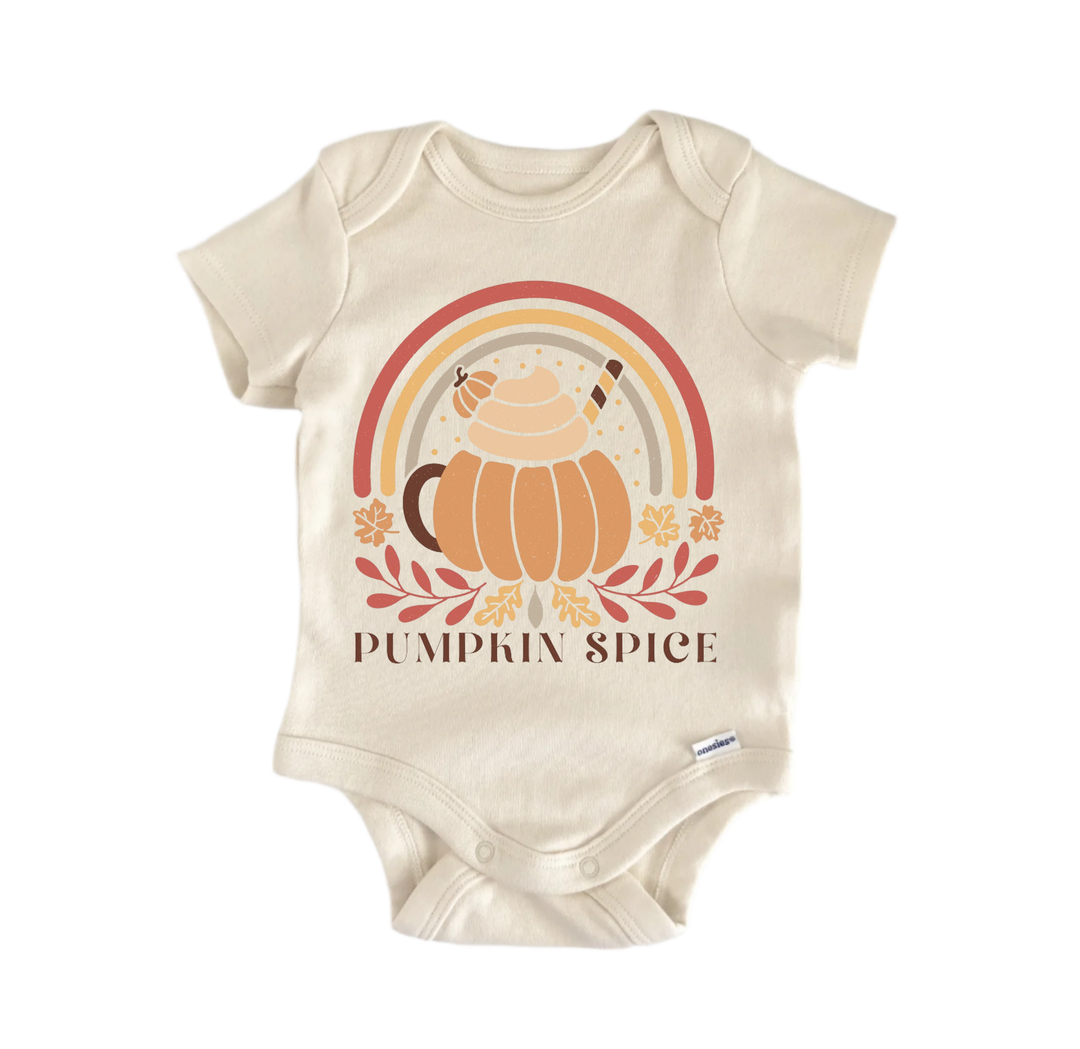 A beige baby onesie with a graphic design featuring a pumpkin, a teapot, and a rainbow. The text below the design says "PUMPKIN SPICE".
