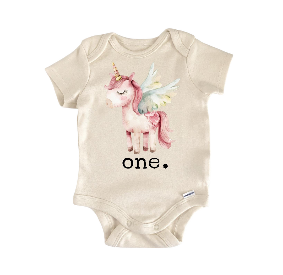 a white onesuit with a pink unicorn on it