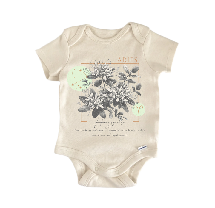 a beige baby onesie with a graphic design on the front. The design includes a floral pattern and a small zodiac symbol. The text on the onesie reads "Aries" and "Homozygote".