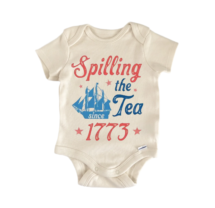 a baby onesie with a printed design on it. The design includes a ship and the text "Spilling the Tea since 1773".