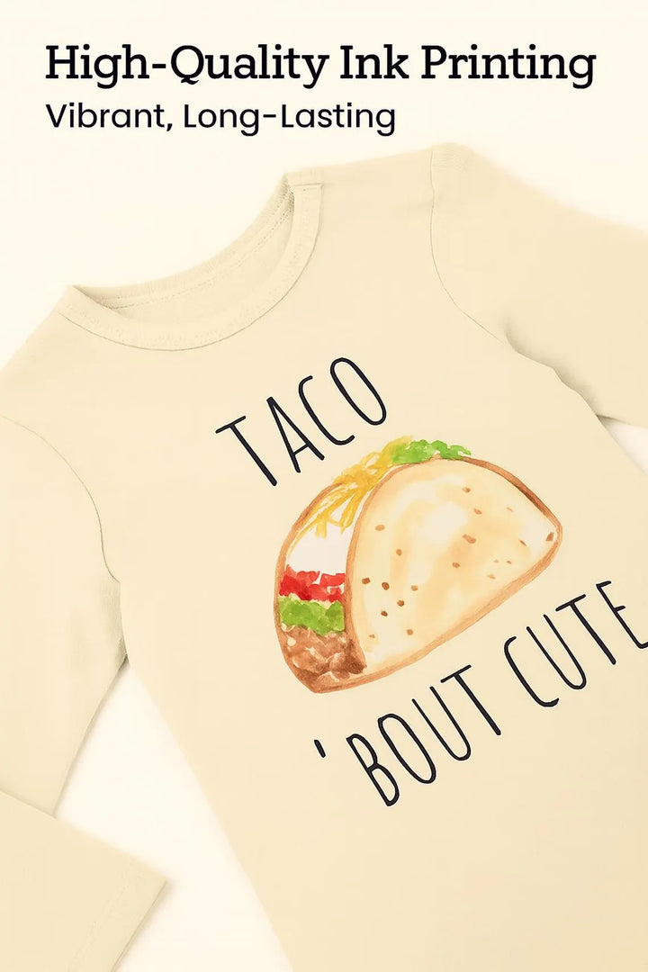 A beige t-shirt with a graphic of a taco and the text "TACO &