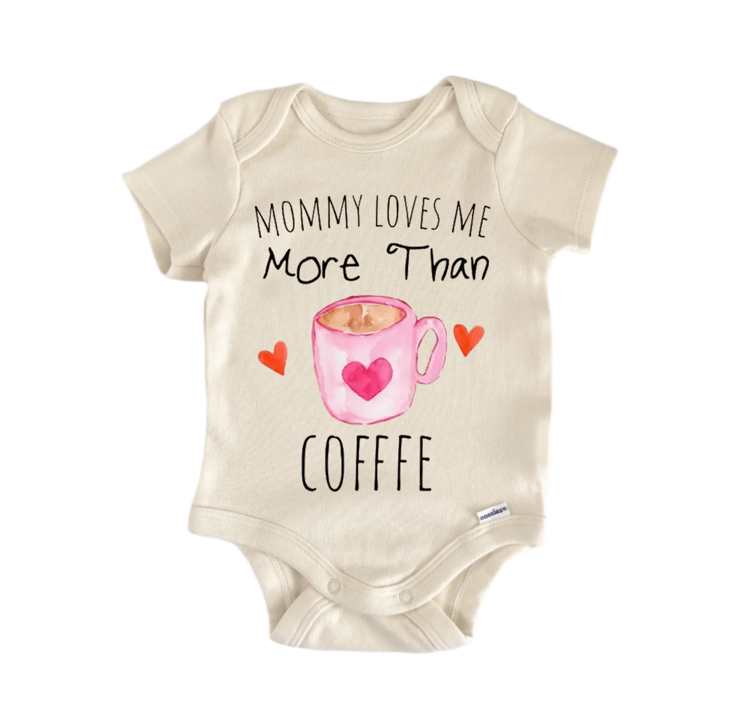 a baby onesie with a printed message that reads "Mommy loves me more than coffee".