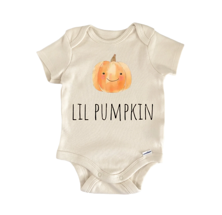 A beige baby onesie with a pumpkin graphic and the text "LIL PUMPKIN" printed on it.