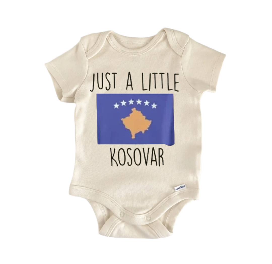 A beige baby onesie with a graphic of the map of Kosova and the text "Just a little Kosova" printed on it.