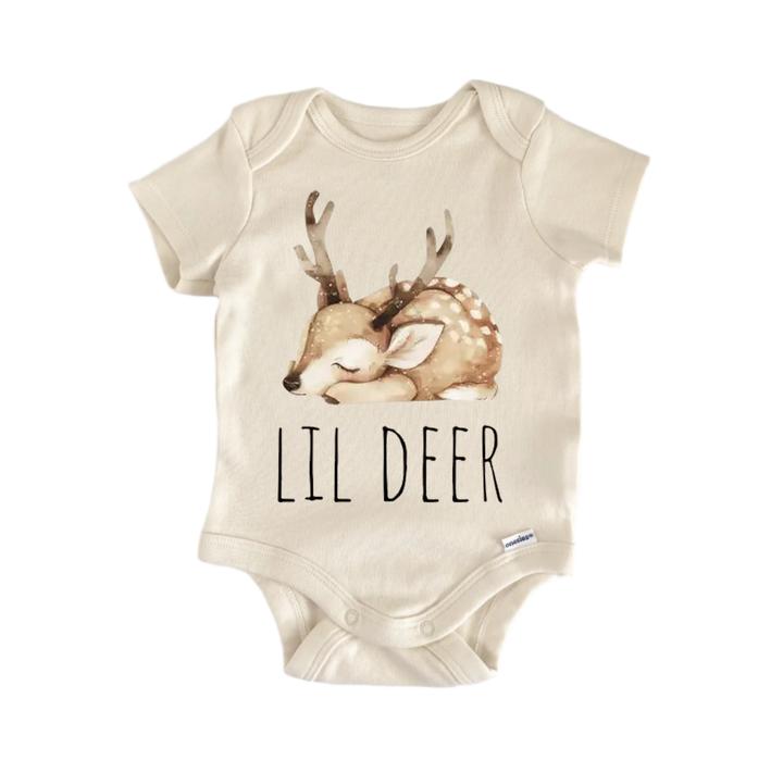 A beige baby onesie with a printed image of a deer and the text "LIL DEER" printed on it.