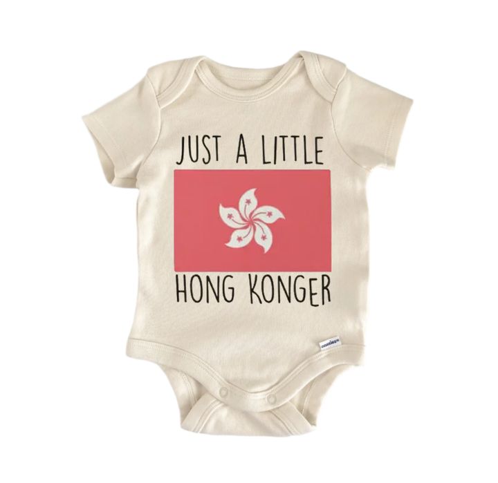 A beige baby onesie with a red square and a white flower design, along with the text "Just a little HONG KONGER" printed on it.
