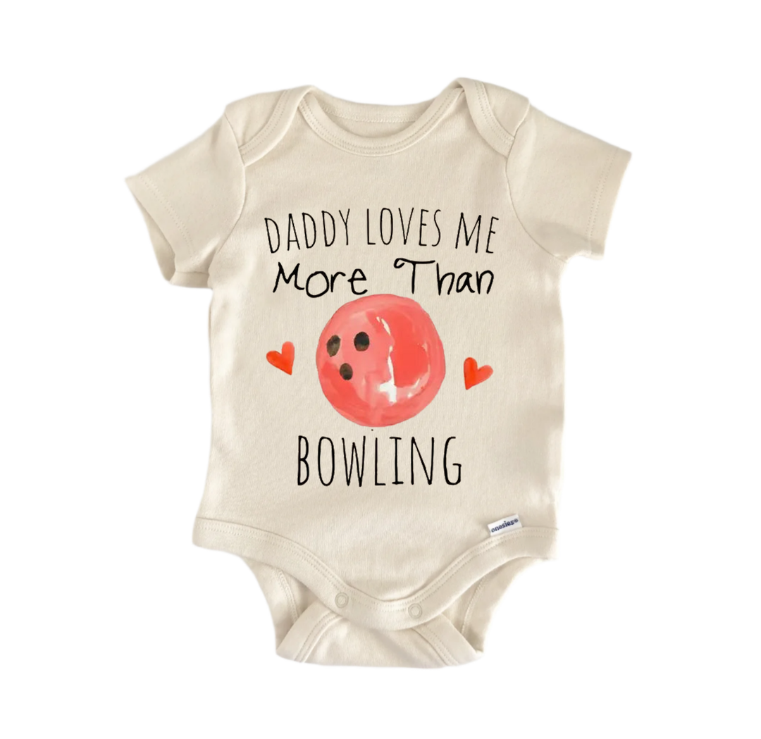 A baby onesie with a printed design that says "DADMY LOVES ME MORE THAN BOWLING" and features a bowling ball graphic.
