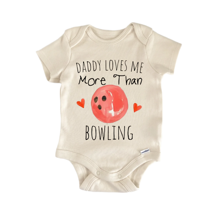 A baby onesie with a printed design that says "DADMY LOVES ME MORE THAN BOWLING" and features a bowling ball graphic.