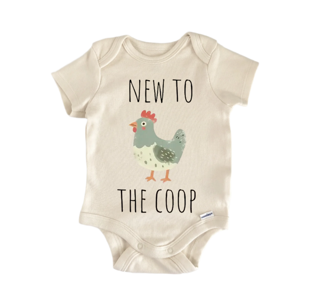 A baby onesie with a cartoon chicken and the text "NEW TO THE COOP" printed on it.