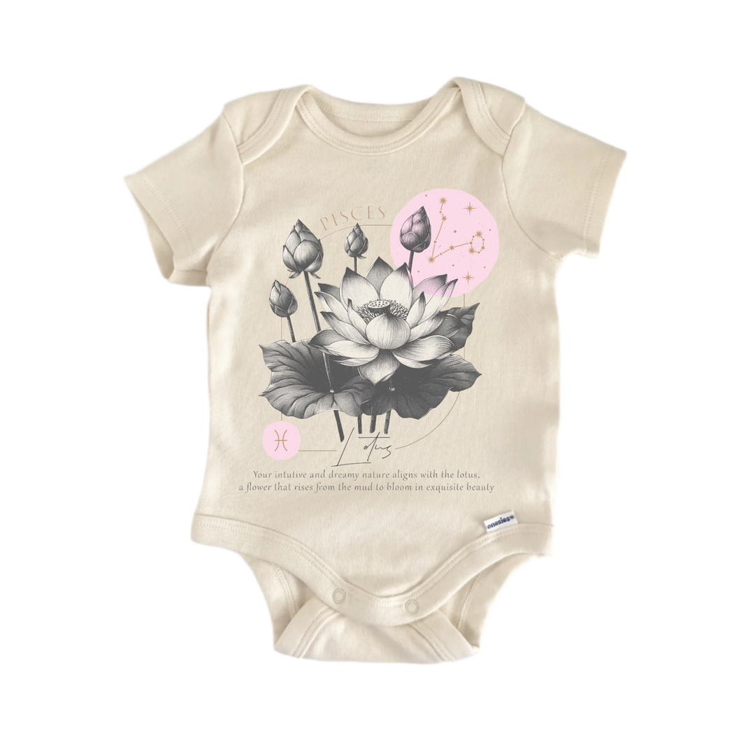 A beige baby onesie with a graphic design featuring a lotus flower and astrological symbols.