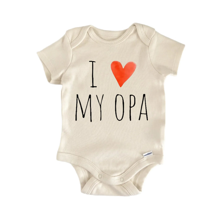 A beige baby onesie with the text "I ♥ MY OPA" printed on it, along with a red heart symbol.