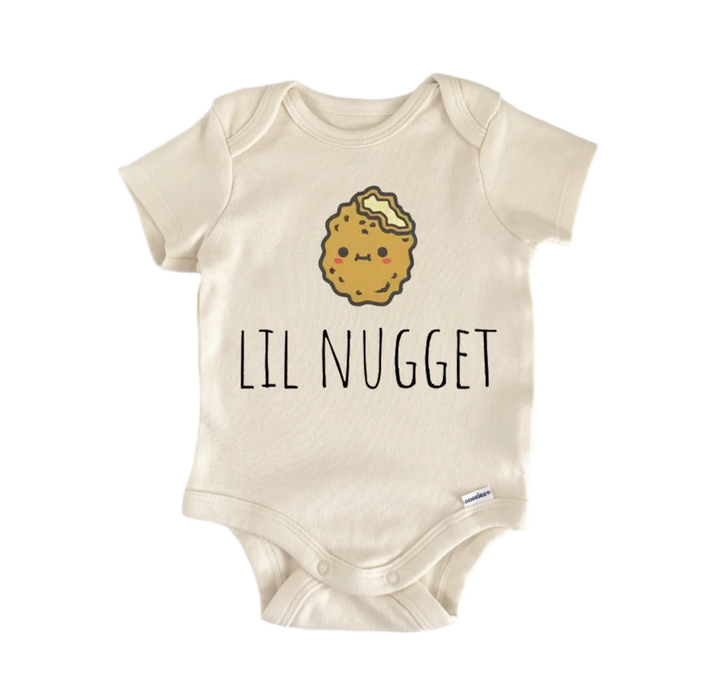 A beige baby onesie with a cartoon image of a fried chicken nugget and the text "LIL NUGGET" printed on it.