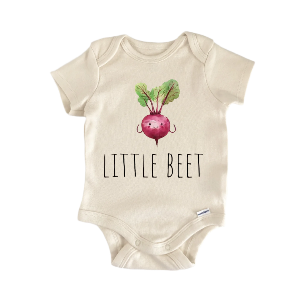 A beige baby onesie with a printed image of a beet and the text "LITTLE BEET" printed on it.