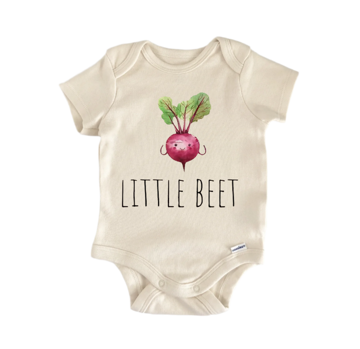 A beige baby onesie with a printed image of a beet and the text "LITTLE BEET" printed on it.