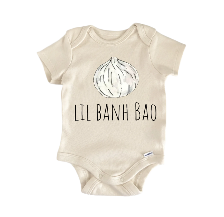 A beige baby onesie with a graphic of a garlic bulb and the text "LIL BANH BÃO" printed on it.