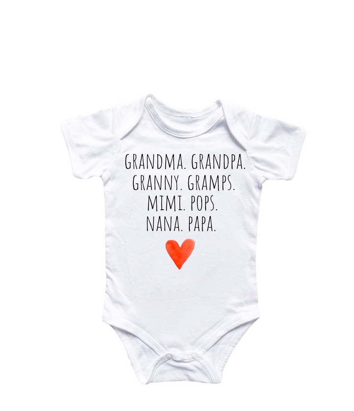 a white bodysuit with a red heart on it