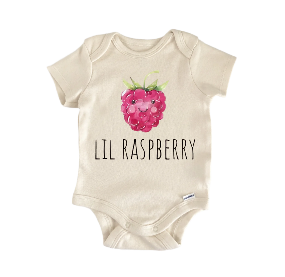 A beige baby onesie with a printed image of a raspberry and the text "LIL RASPBERRY" printed on it.