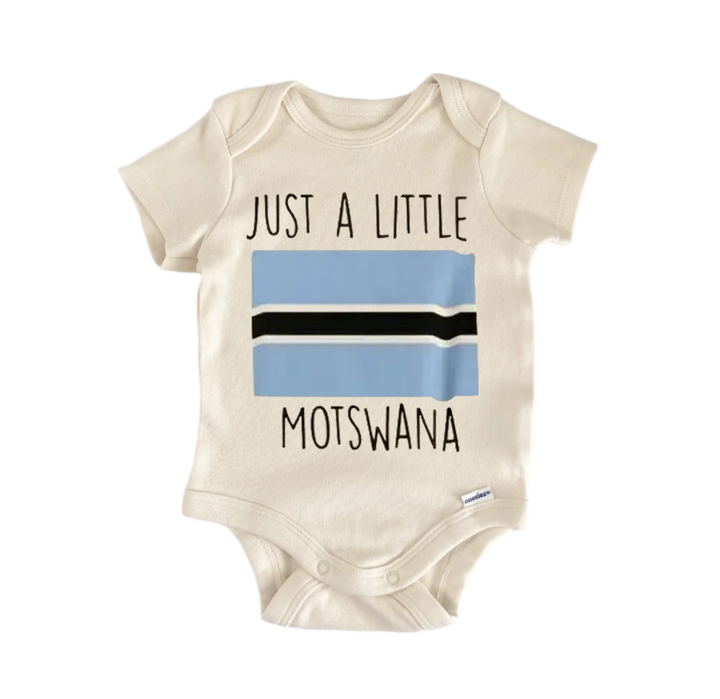 A baby onesie with the text "Just a little Motswana" printed on it.