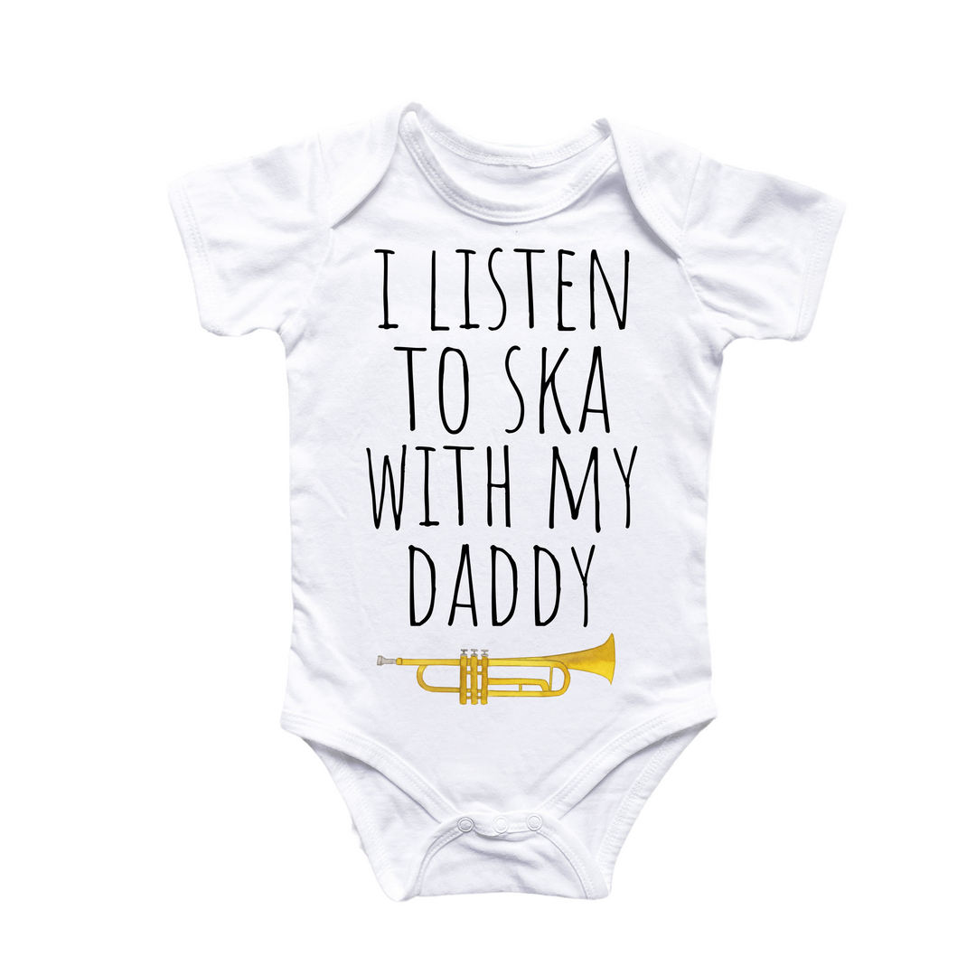 a baby bodysuit with a trumpet printed on it