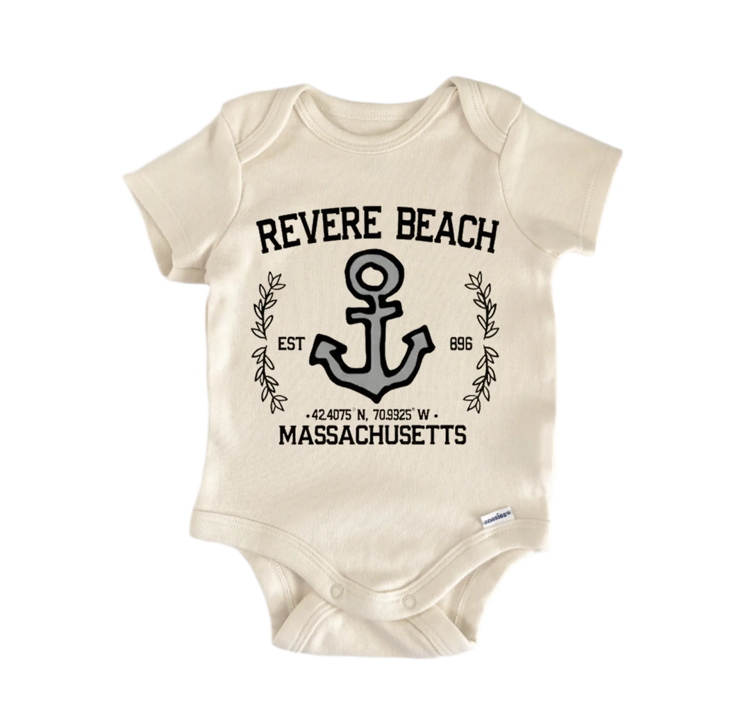 A beige baby onesie with a graphic design featuring an anchor and text that reads "REVERE BEACH EST. 898 W. MASSACHUSETTS".