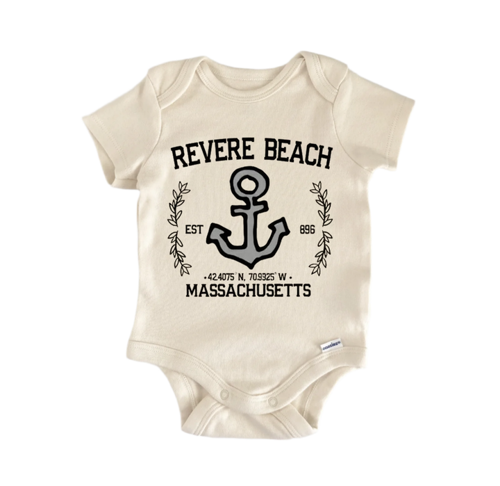 A beige baby onesie with a graphic design featuring an anchor and text that reads "REVERE BEACH EST. 898 W. MASSACHUSETTS".